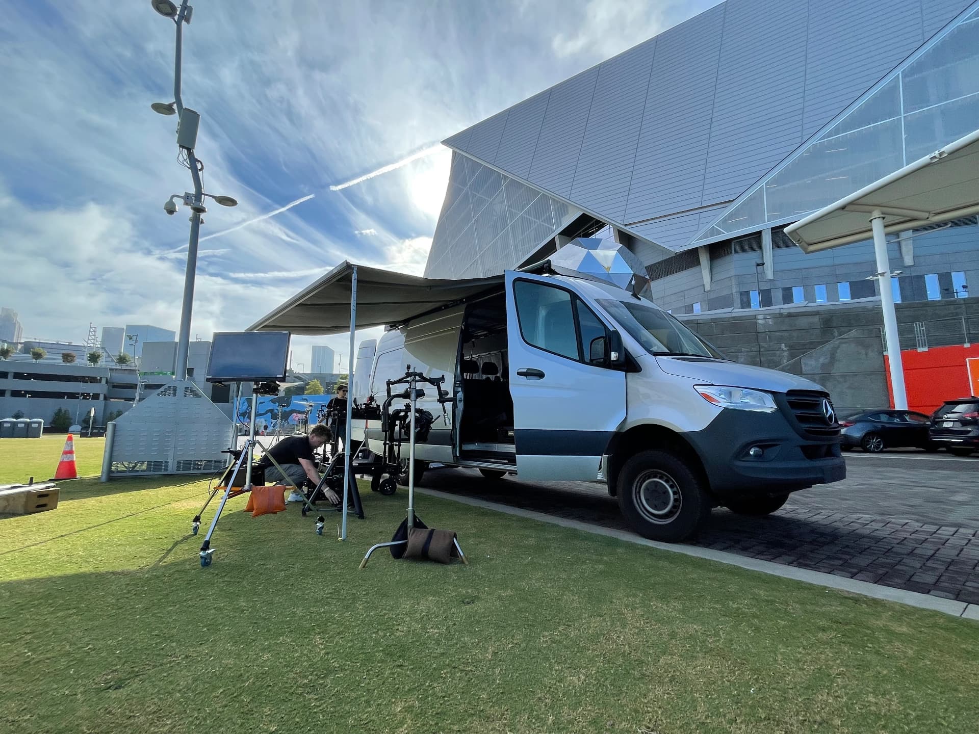 Whisper mobile production unit set up on location with crew and monitors